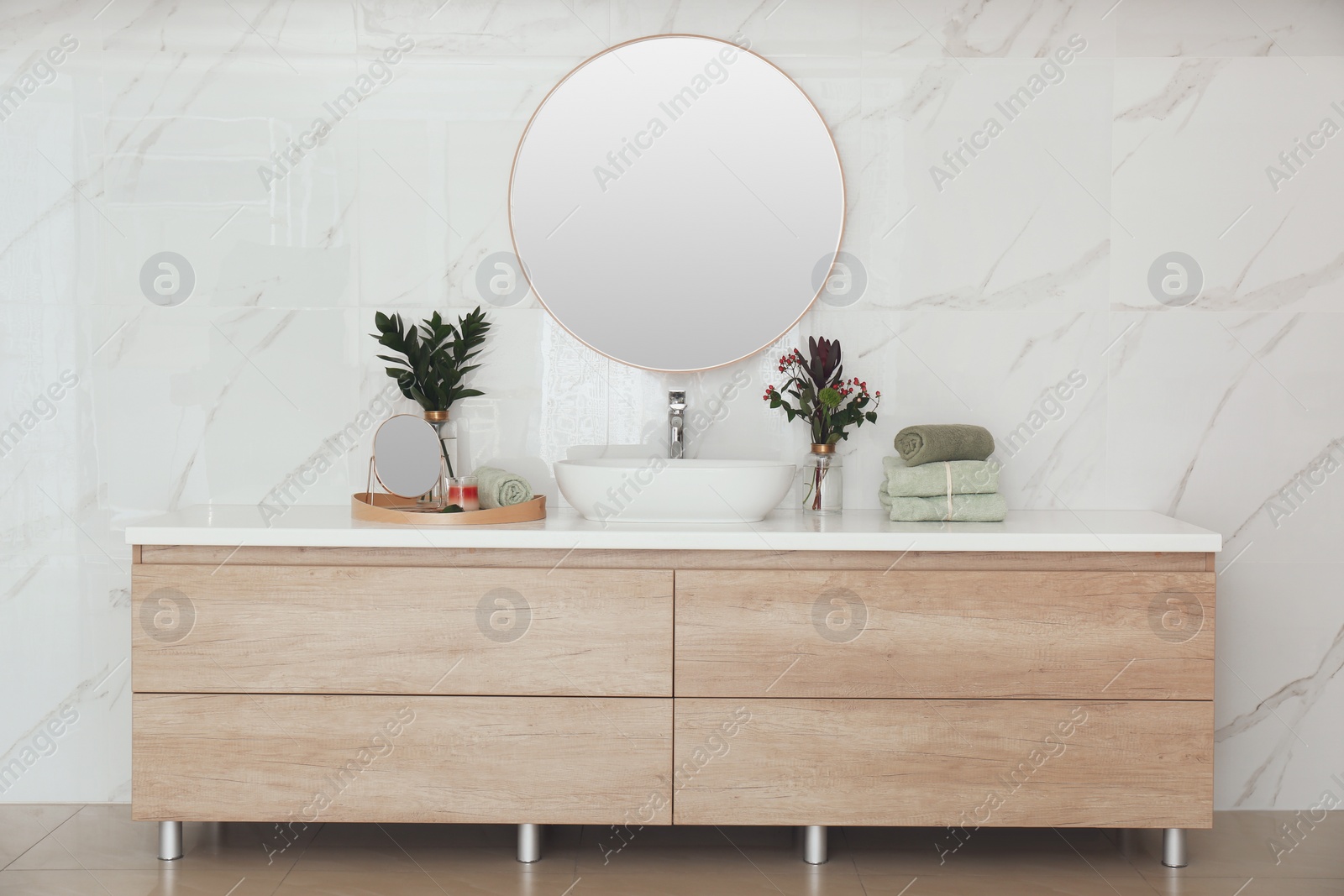 Photo of Modern bathroom interior with stylish mirror and vessel sink