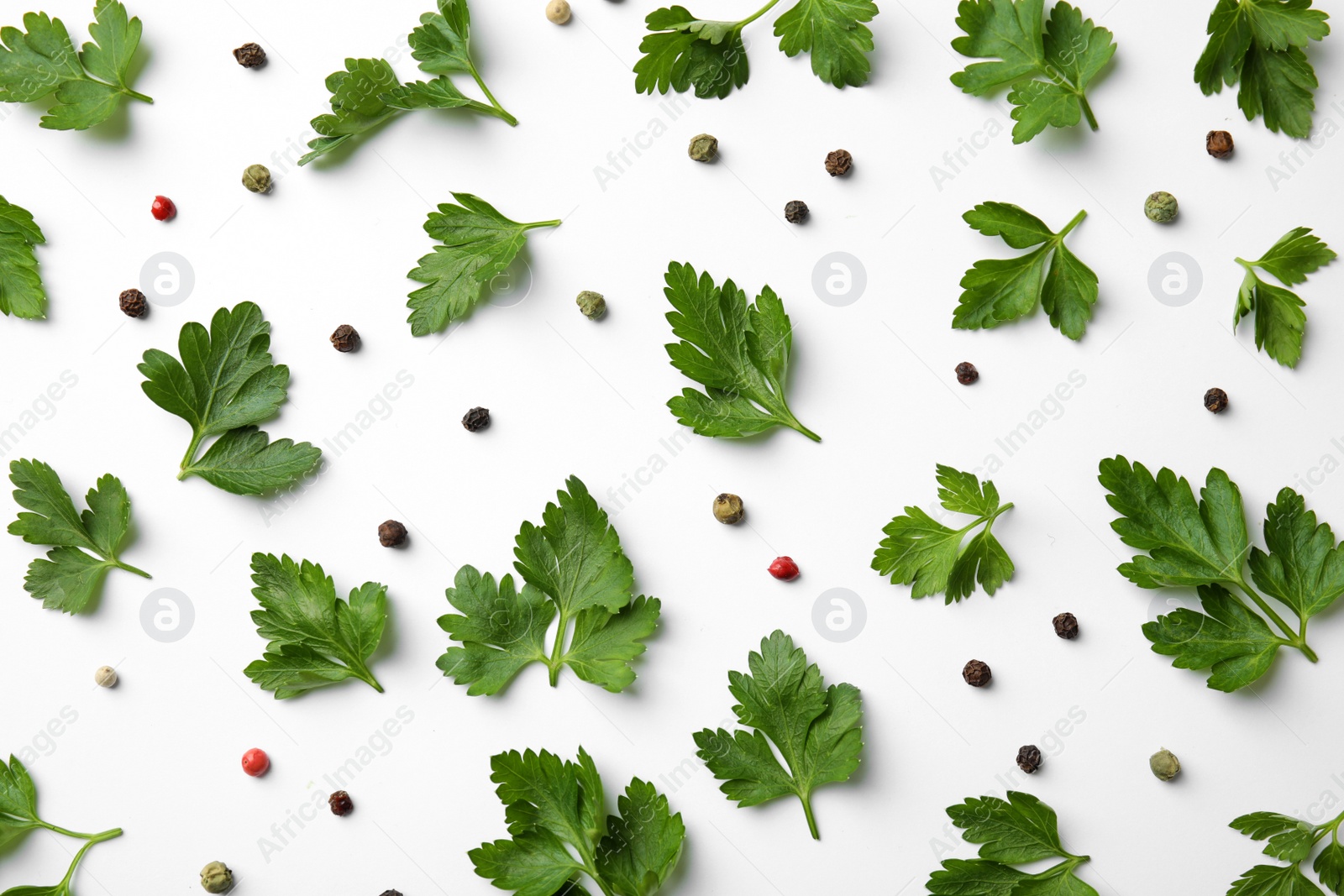 Photo of Flat lay composition with green parsley and pepper on white background