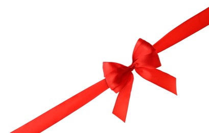 Photo of Red ribbon with bow on white background. Festive decoration