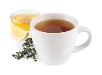 Photo of Aromatic herbal tea with thyme, honey and lemon isolated on white
