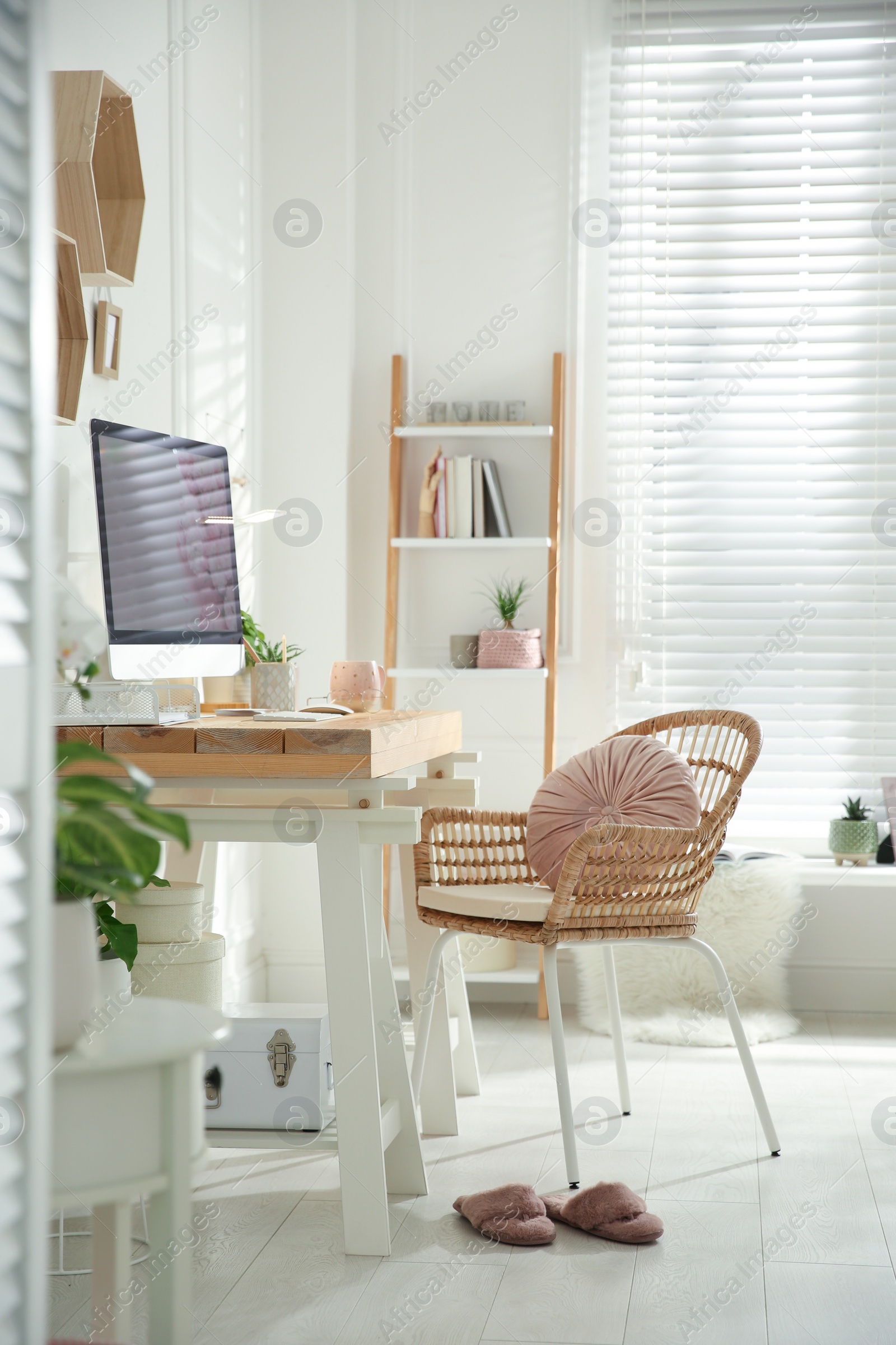 Photo of Stylish home office interior with comfortable workplace