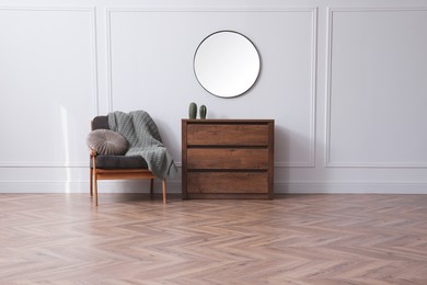 Photo of Modern living room with parquet flooring and stylish furniture