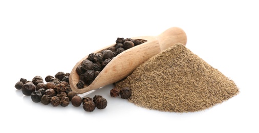 Wooden scoop with black pepper grains and heap of powder on white background