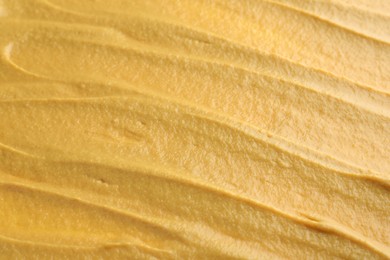 Photo of Fresh tasty mustard sauce as background, closeup