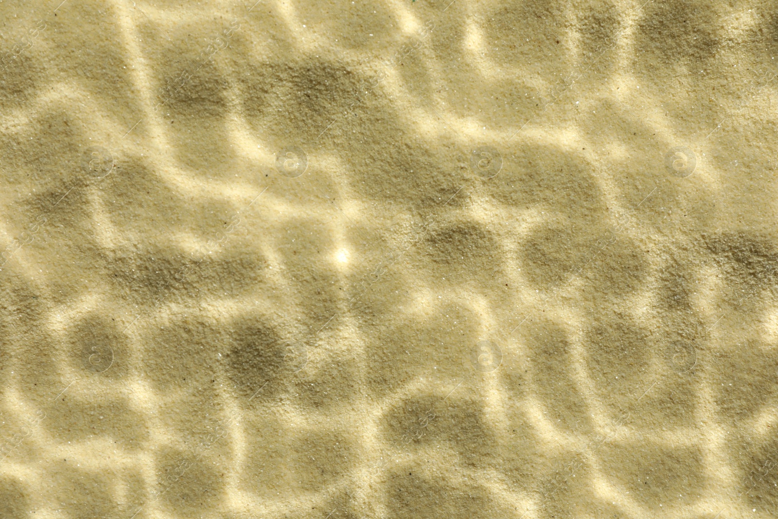 Photo of Sand under water as background, top view