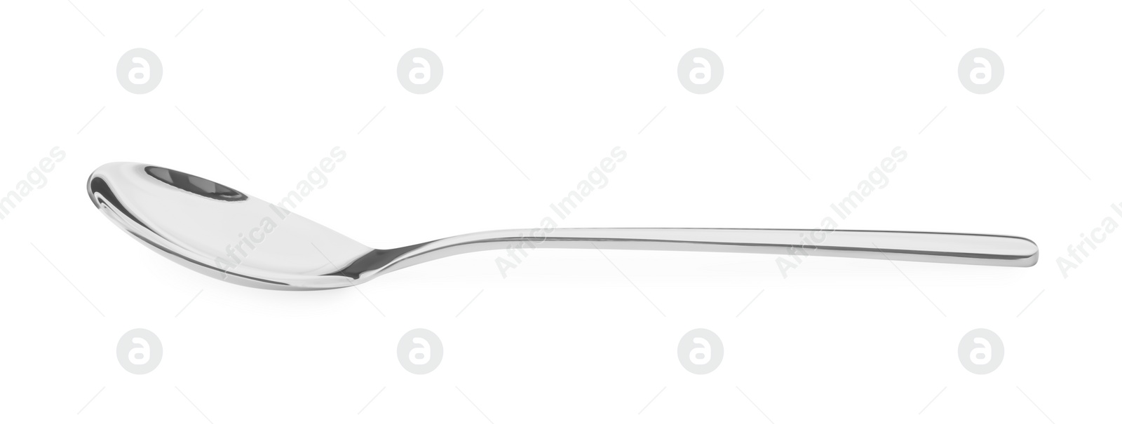 Photo of One shiny silver spoon isolated on white