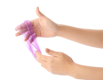 Photo of Woman playing with purple slime isolated on white, closeup. Antistress toy