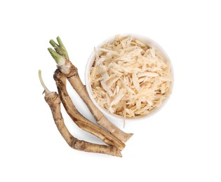 Grated and cut horseradish roots isolated on white, top view