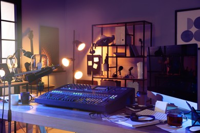 Professional audio equipment in modern radio studio