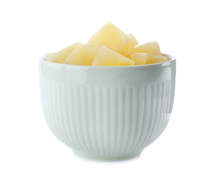 Photo of Pieces of delicious canned pineapple in bowl on white background