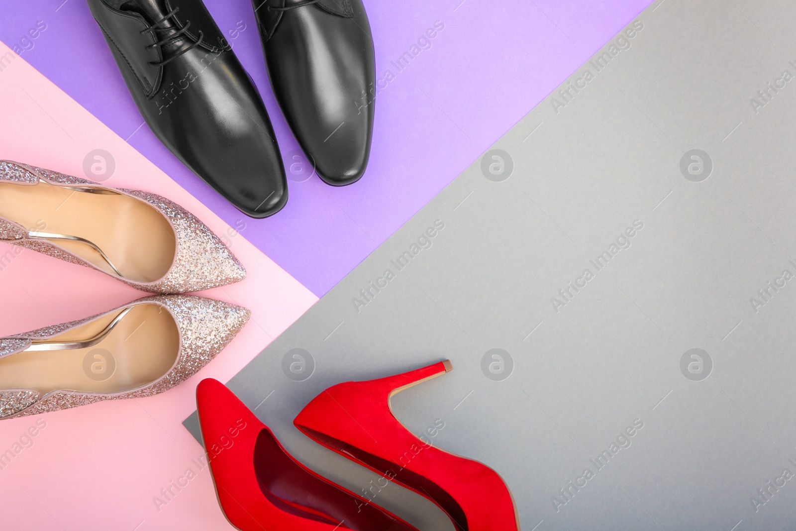 Photo of Different female shoes on color background