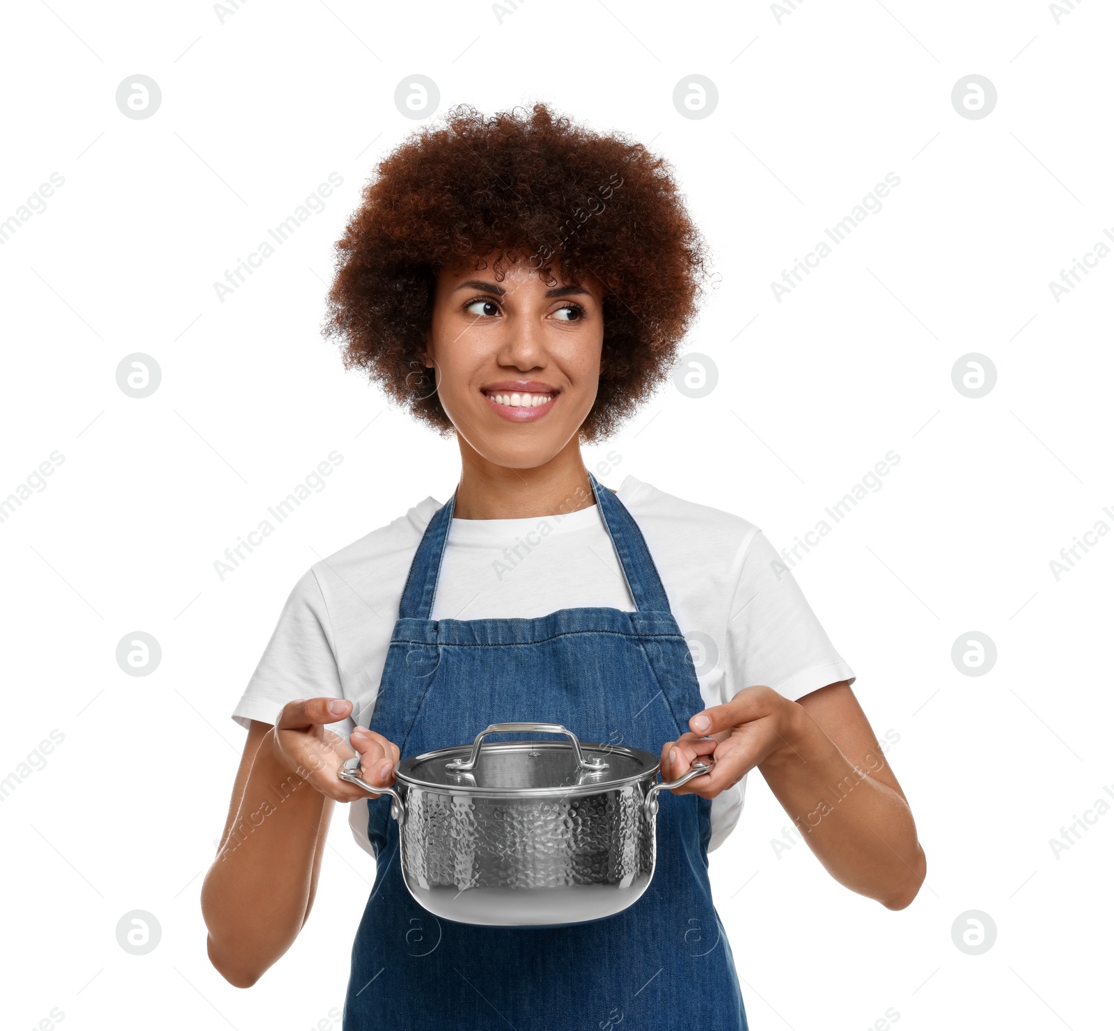 Photo of Happy young woman in apron holding cooking pot on white background