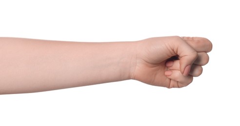 Photo of Playing rock, paper and scissors. Woman showing fist on white background, closeup