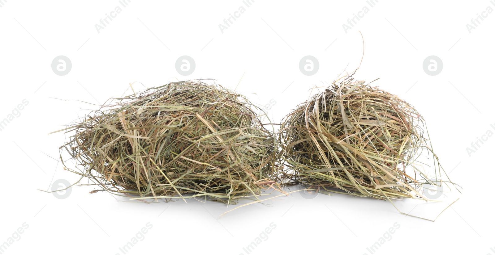 Photo of Dried hay isolated on white. Livestock feed