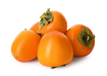 Delicious ripe juicy persimmons on white background