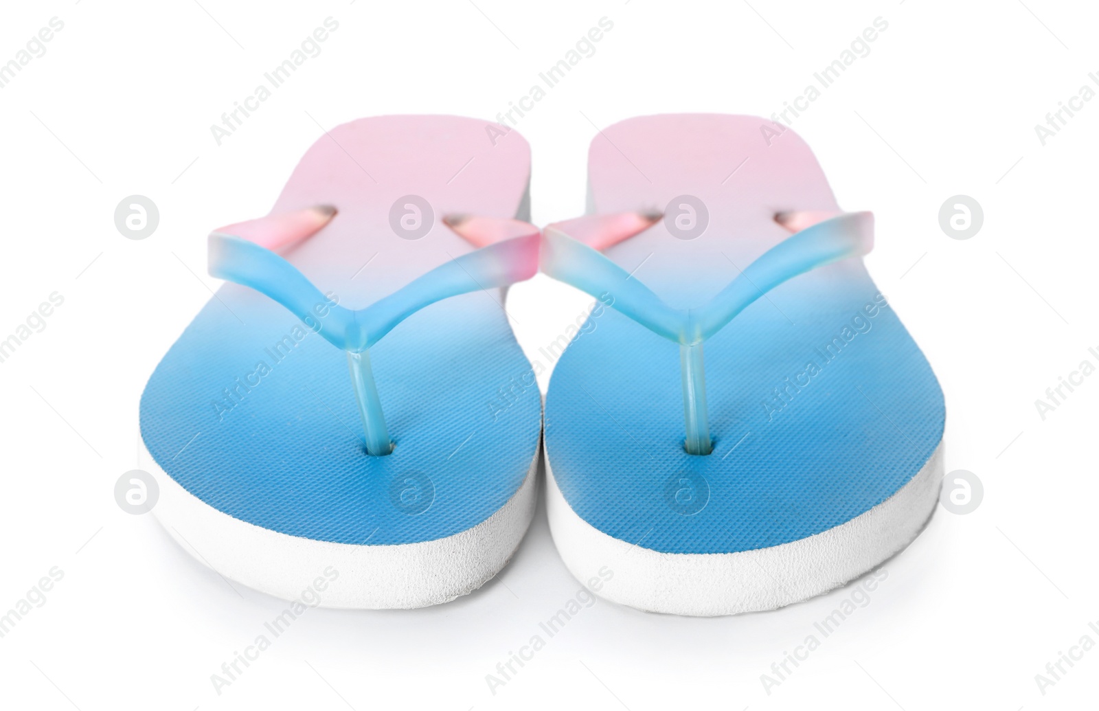 Photo of Bright flip flops on white background. Beach object