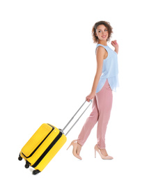Photo of Beautiful woman with yellow suitcase on white background