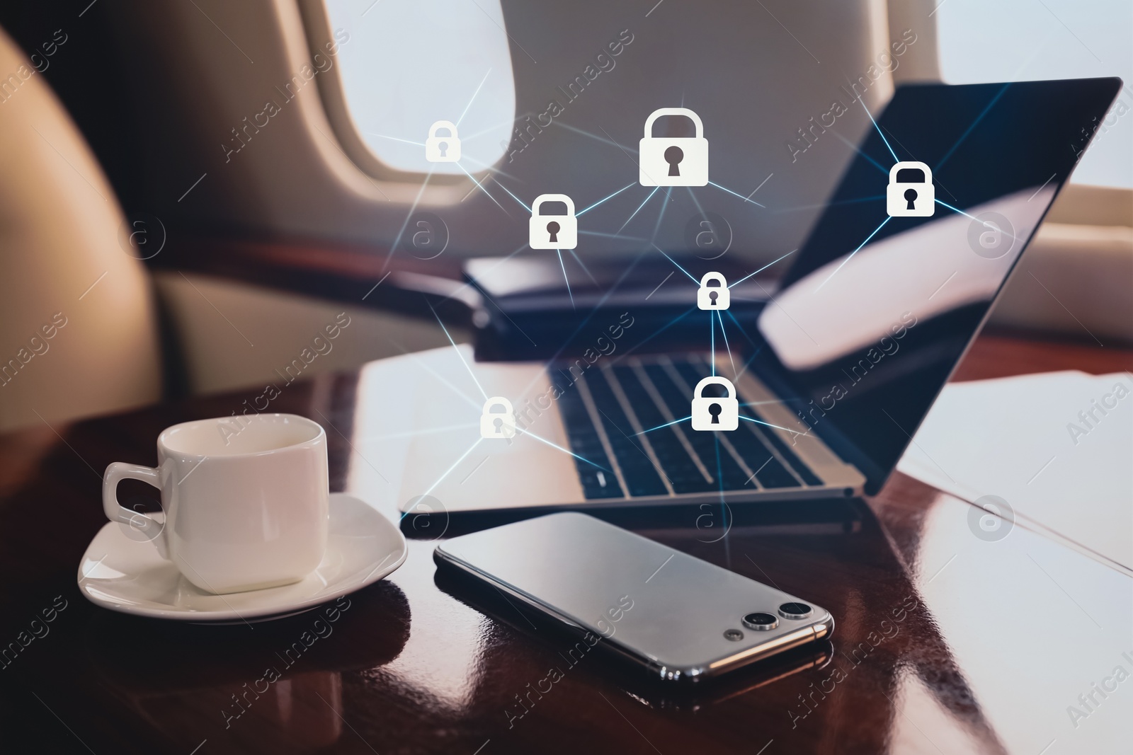 Image of Privacy protection. Digital scheme with padlocks over laptop, smartphone and coffee in airplane