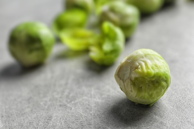 Photo of Fresh Brussels sprout on table. Space for text