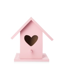 Photo of Beautiful pink bird house with heart shaped hole isolated on white