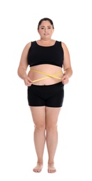 Photo of Full length portrait of fat woman with measuring tape on white background. Weight loss