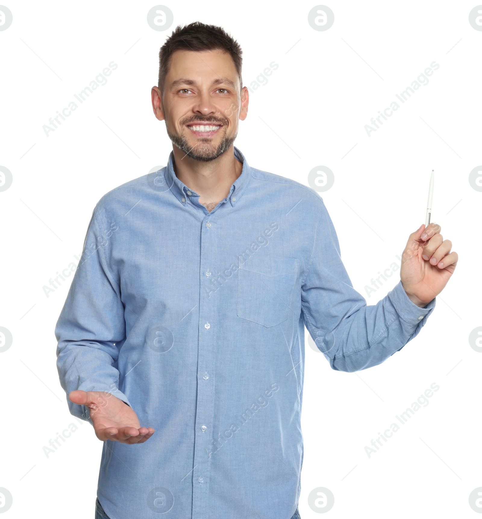 Photo of Handsome man pointing at something with pen on white background. Weather forecast reporter