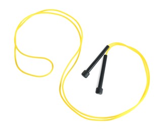 Photo of Yellow skipping rope with black handles isolated on white, top view