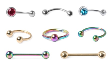 Image of Set with different piercing jewelry on white background