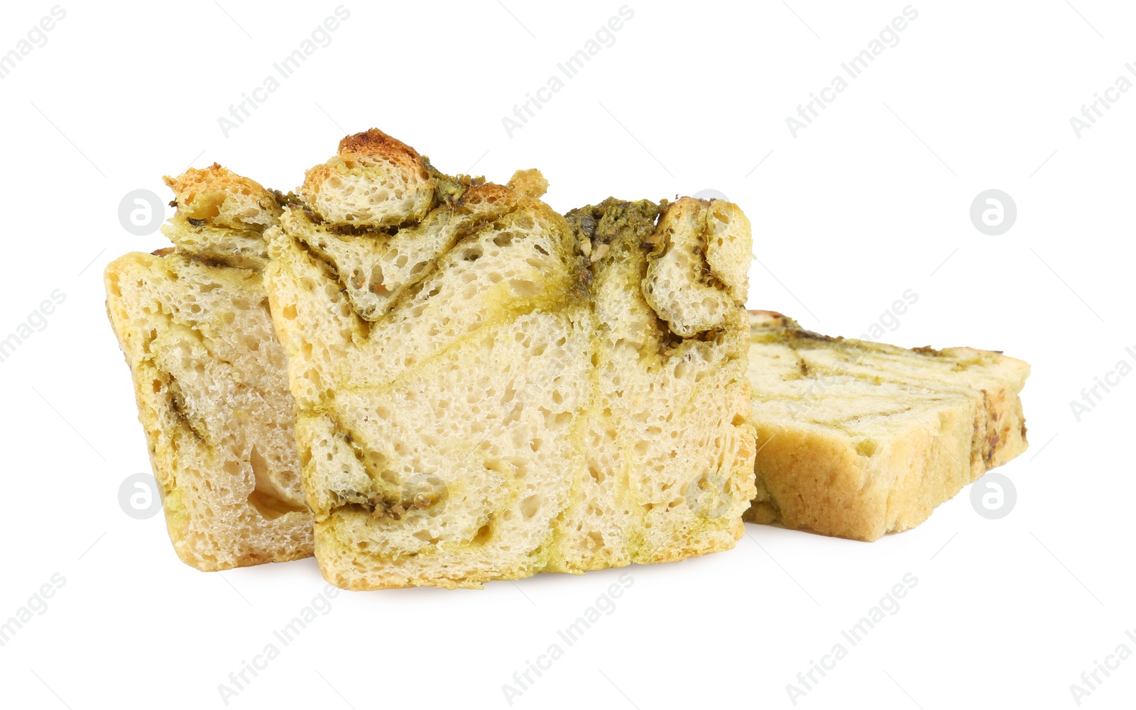 Photo of Slices of freshly baked pesto bread isolated on white