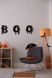 Photo of Modern room decorated for Halloween. Festive interior