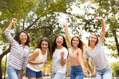 Photo of Happy women outdoors on sunny day. Girl power concept
