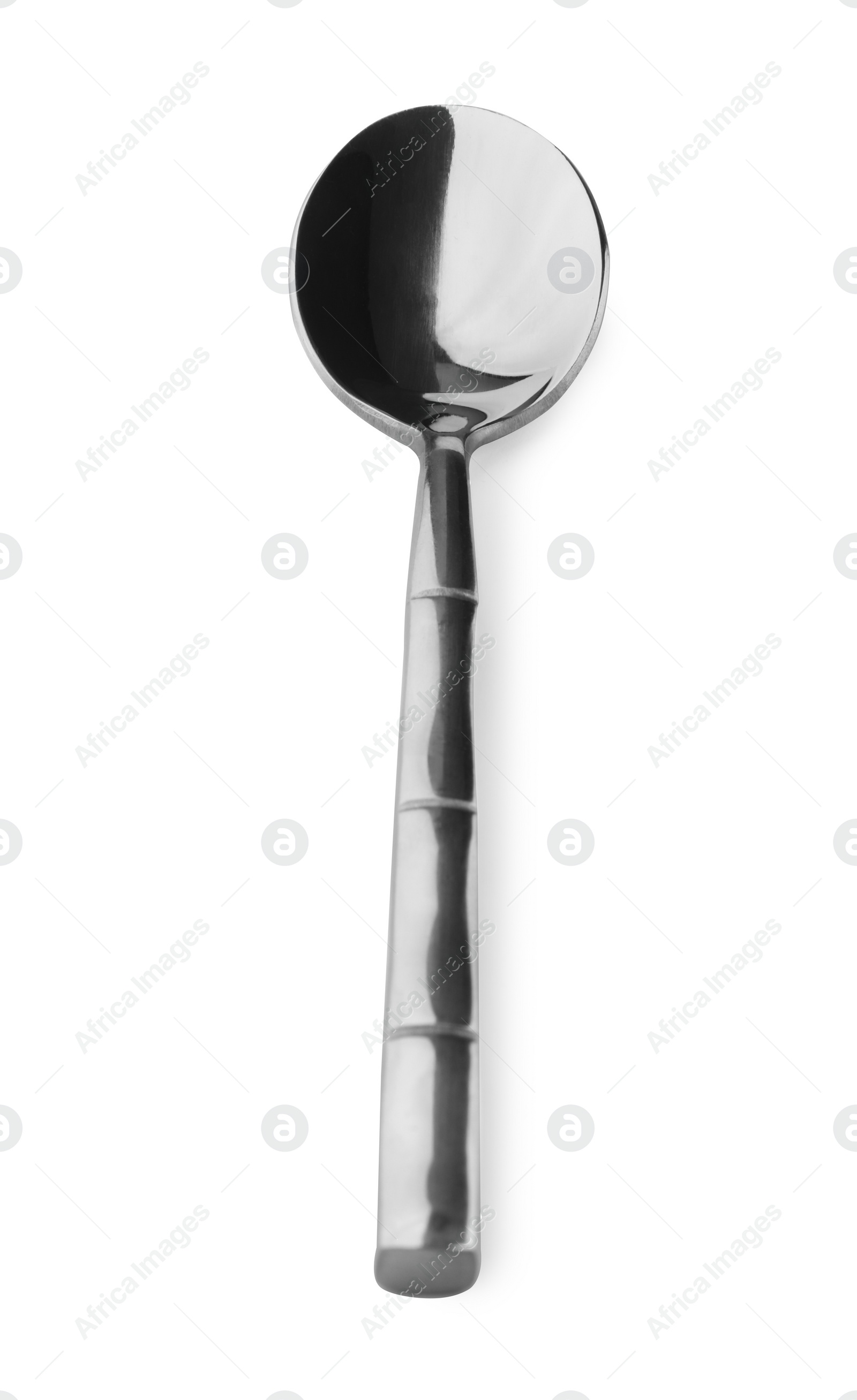 Photo of One new shiny spoon isolated on white