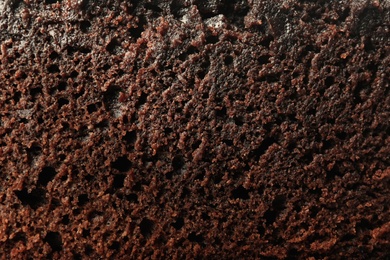 Photo of Fresh brownie as background, closeup. Delicious chocolate pie