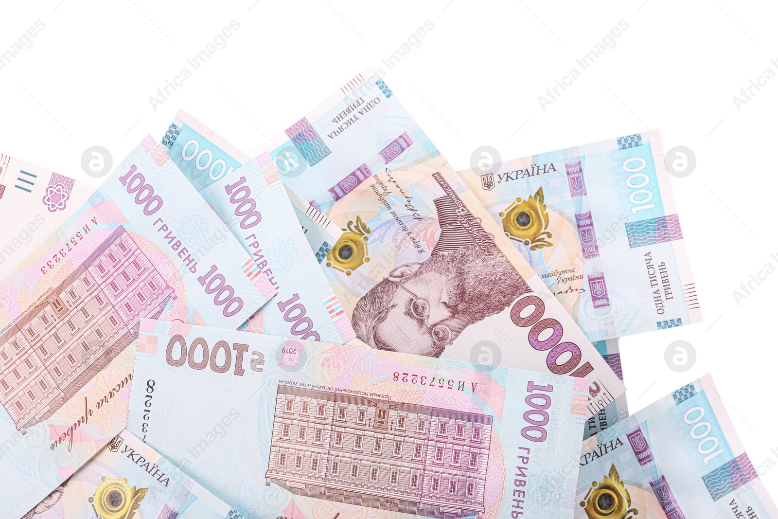 Photo of 1000 Ukrainian Hryvnia banknotes on white background, top view