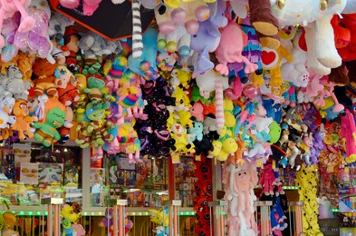 Photo of Netherlands, Groningen - May 18, 2022: Beautiful stall with different toys for winning