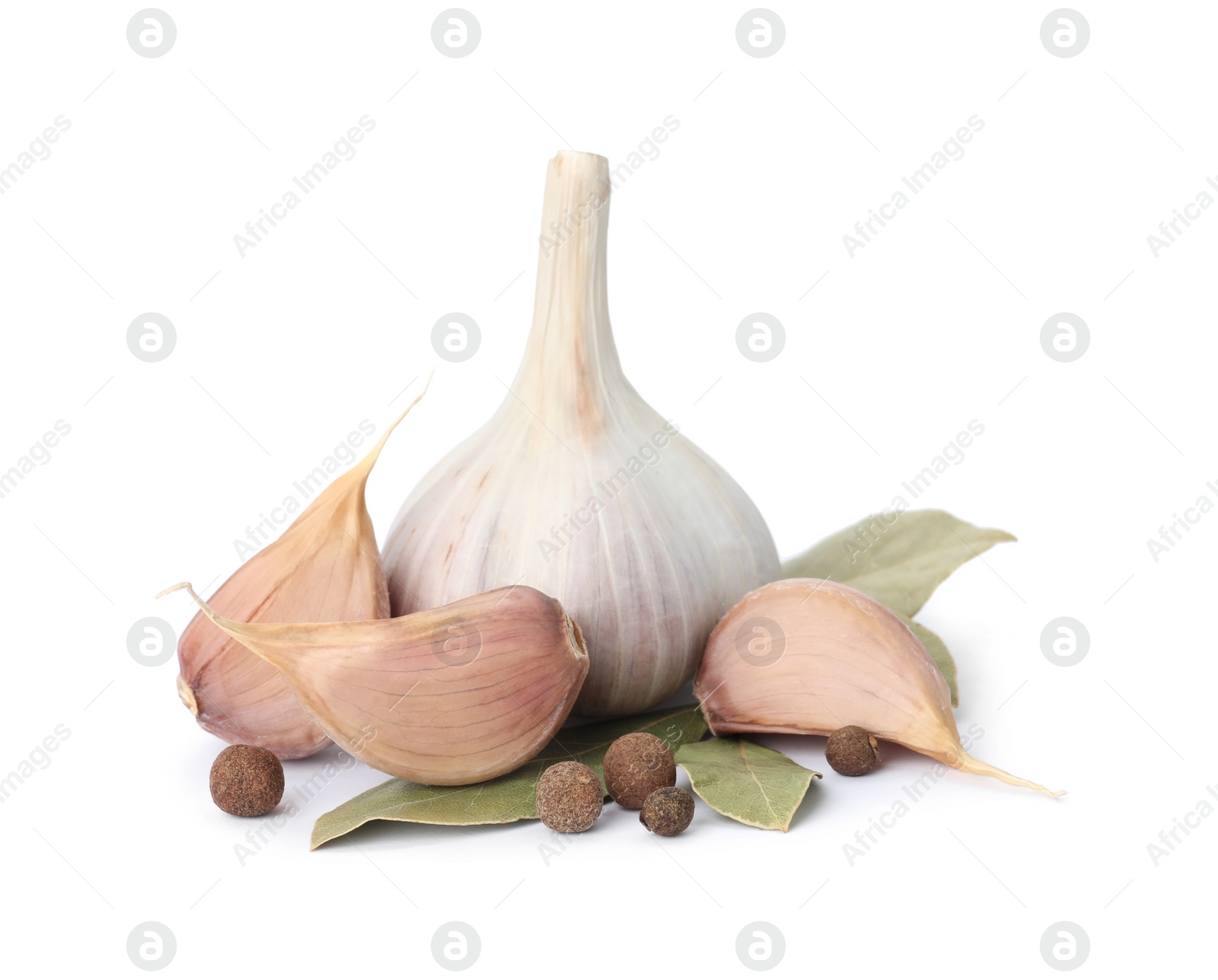 Photo of Fresh garlic bulb and cloves with seasonings isolated on white. Organic food