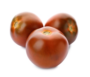 Photo of Fresh ripe brown tomatoes on white background