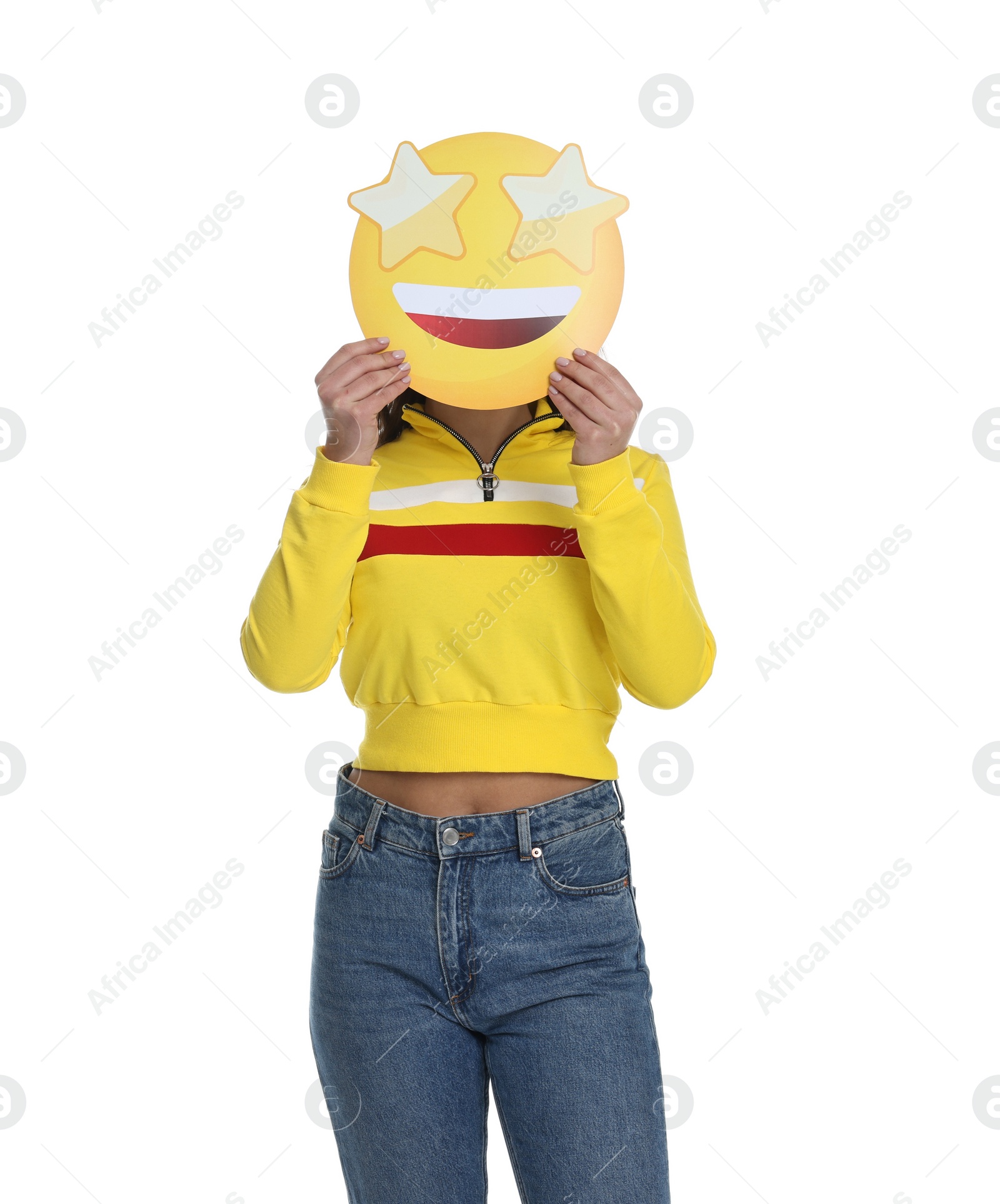 Photo of Woman holding emoticon with stars instead of eyes on white background