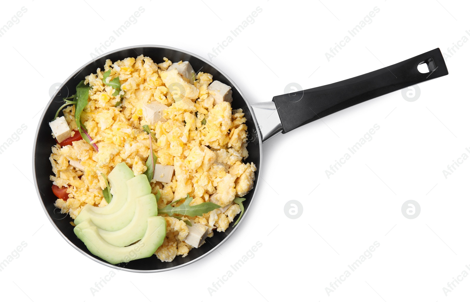 Photo of Frying pan with delicious scrambled eggs, tofu and avocado isolated on white, top view