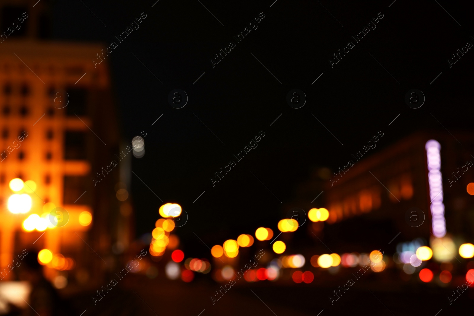 Photo of Blurred view of beautiful city at night. Bokeh effect