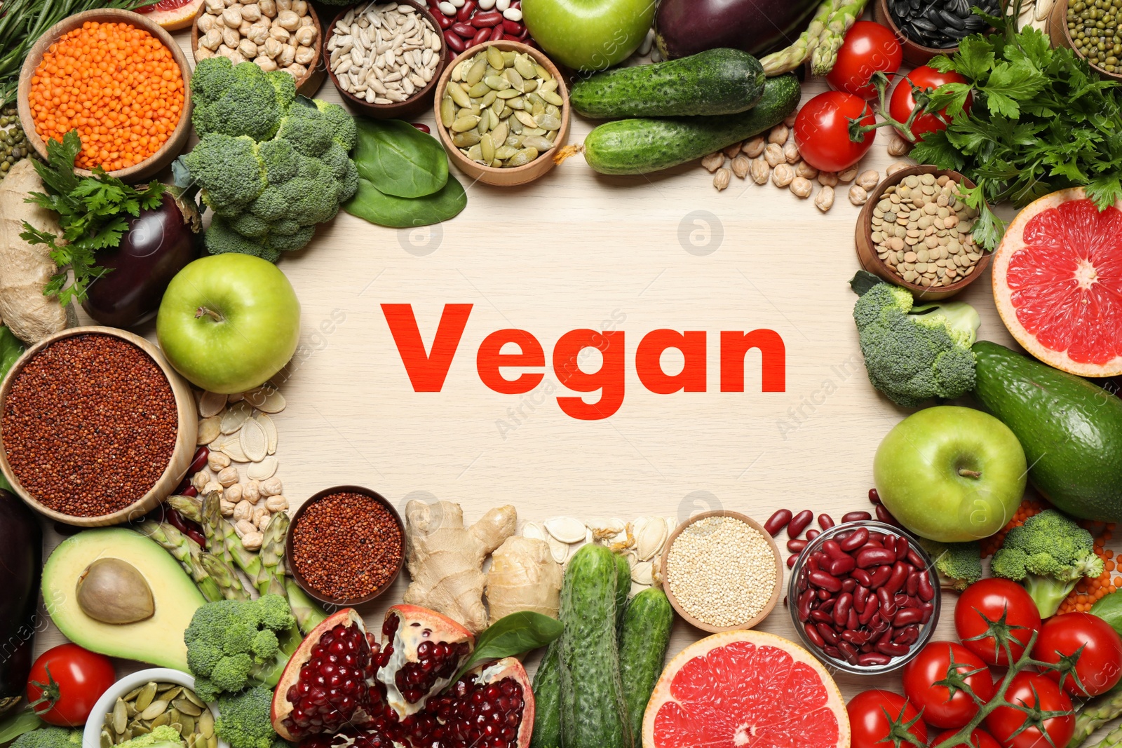 Image of Word Vegan and fresh products on wooden background, flat lay