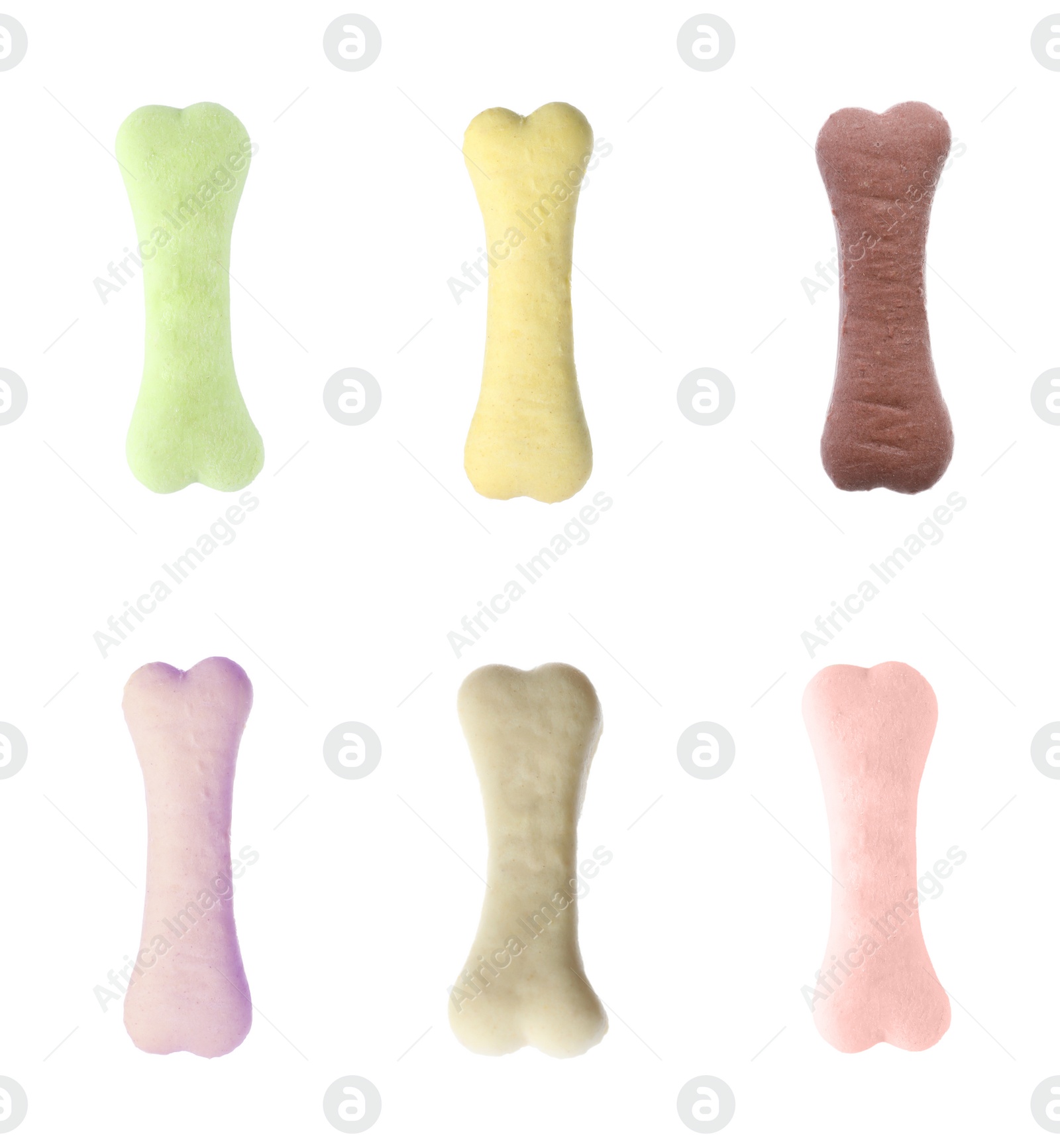 Image of Set of different bone shaped dog cookies on white background