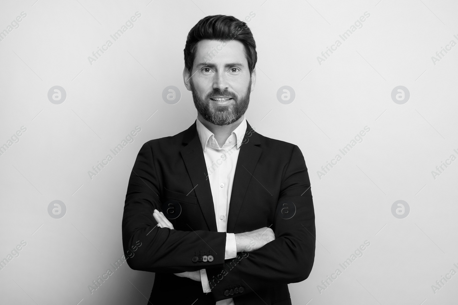 Image of Portrait of handsome man on light background. Black and white effect