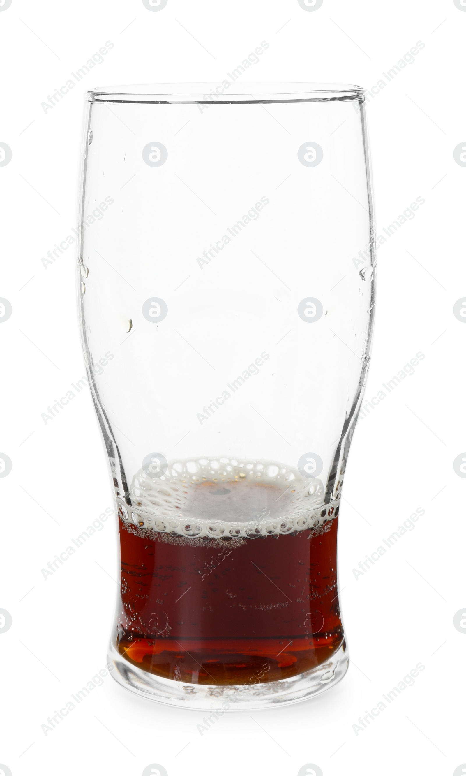 Photo of Almost empty glass of beer isolated on white