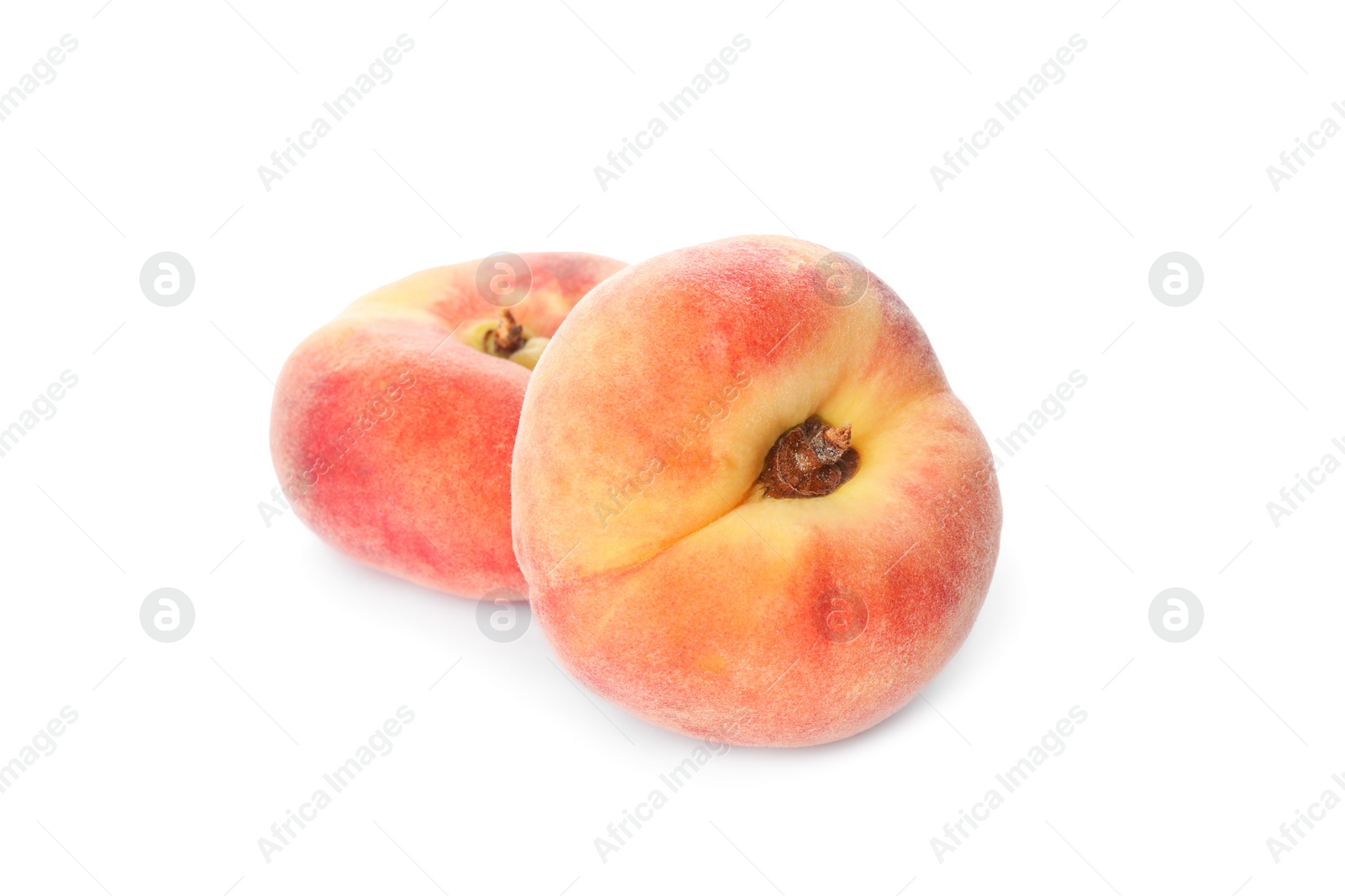 Photo of Fresh ripe donut peaches on white background