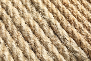 Natural hemp ropes as background, closeup view