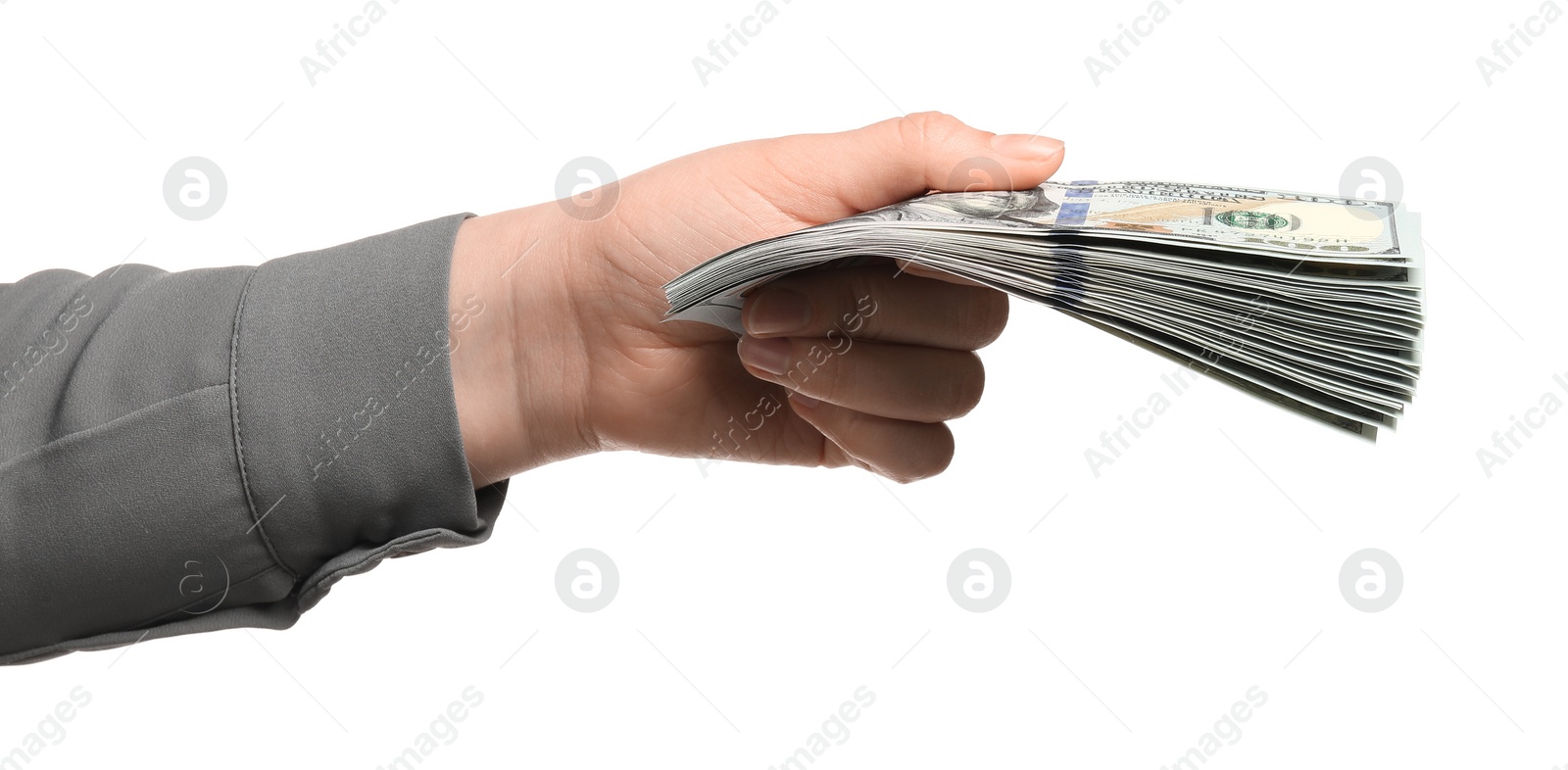 Photo of Money exchange. Woman holding dollar banknotes on white background, closeup