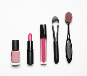 Photo of Set of makeup products on white background, top view