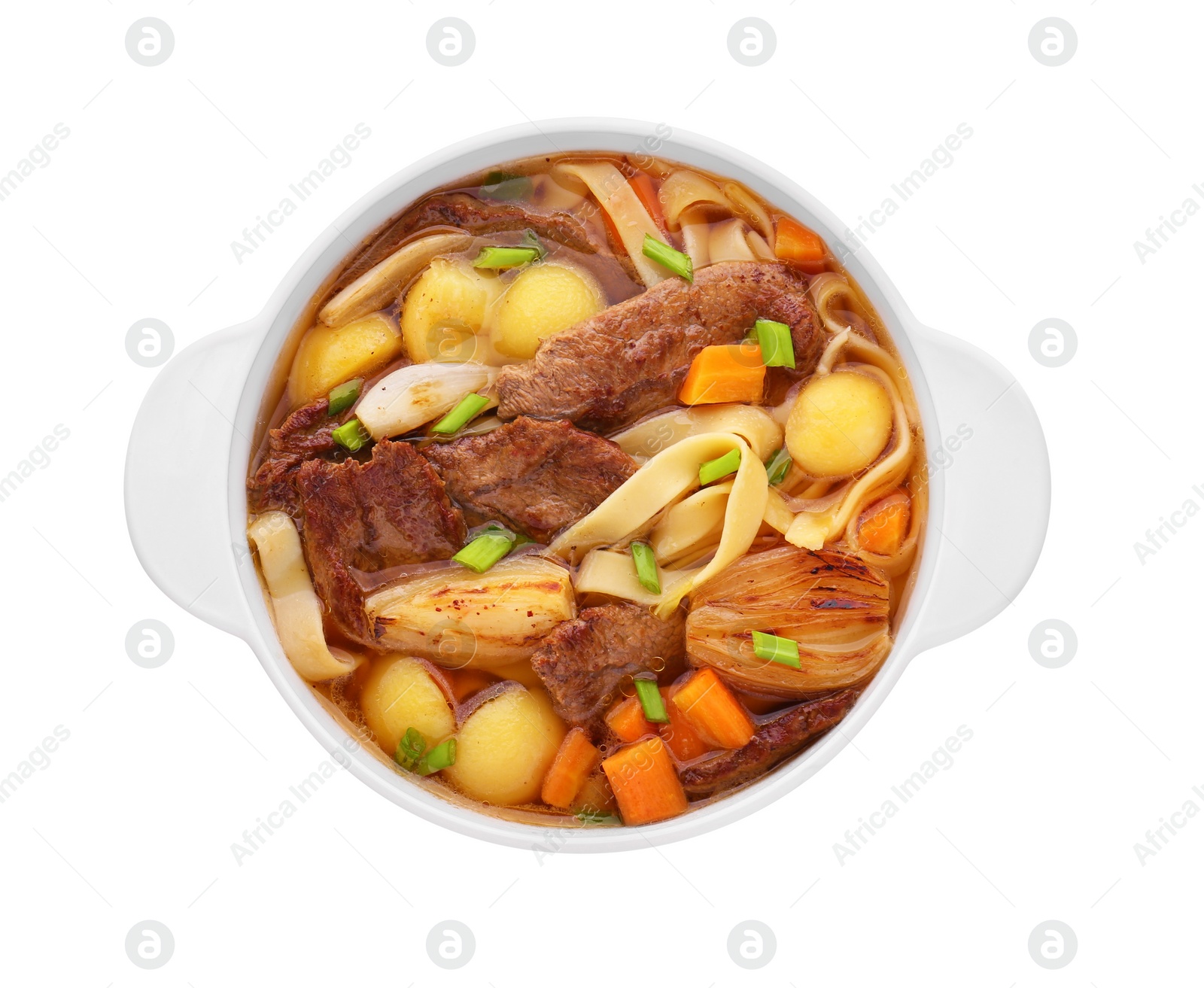 Photo of Pot of delicious vegetable soup with meat, noodles and ingredients isolated on white, top view