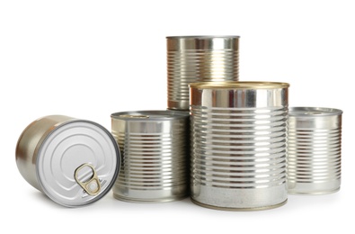 Many closed tin cans isolated on white, mockup for design